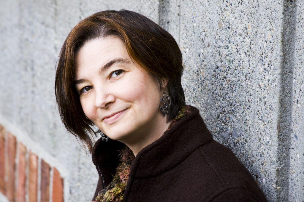 Author photo in color of Kelly Jones.